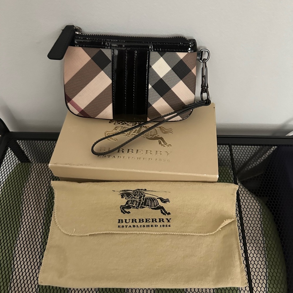 Burberry Vintage nova check wristlet in black patent leather.